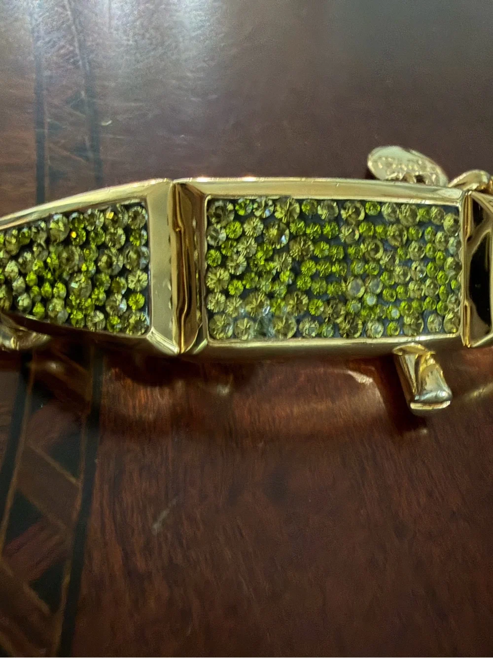 Henri Bendel Gold Tone Bracelet with Green Crystals Toggle Closure 7.5”